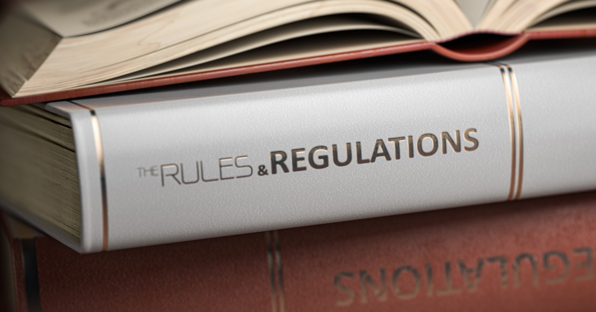 A book titled 'The Rules & Regulations" is seen representing how law firms must abide to trust compliance and other laws in how they handle payments from their clients.